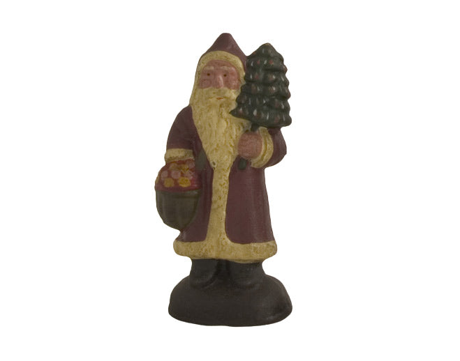 Santa Holding Chistmas Tree