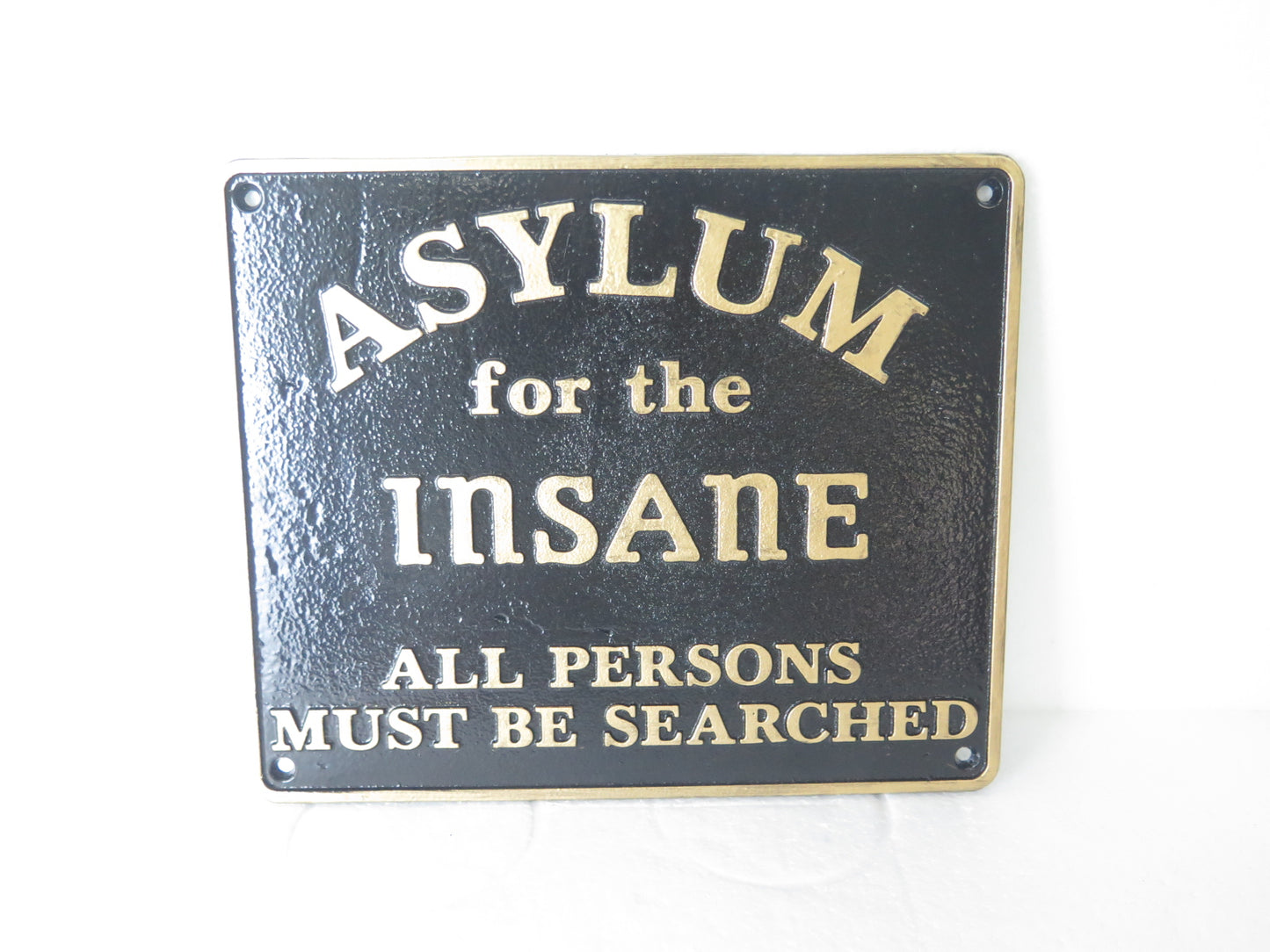 Asylum for the insane sign