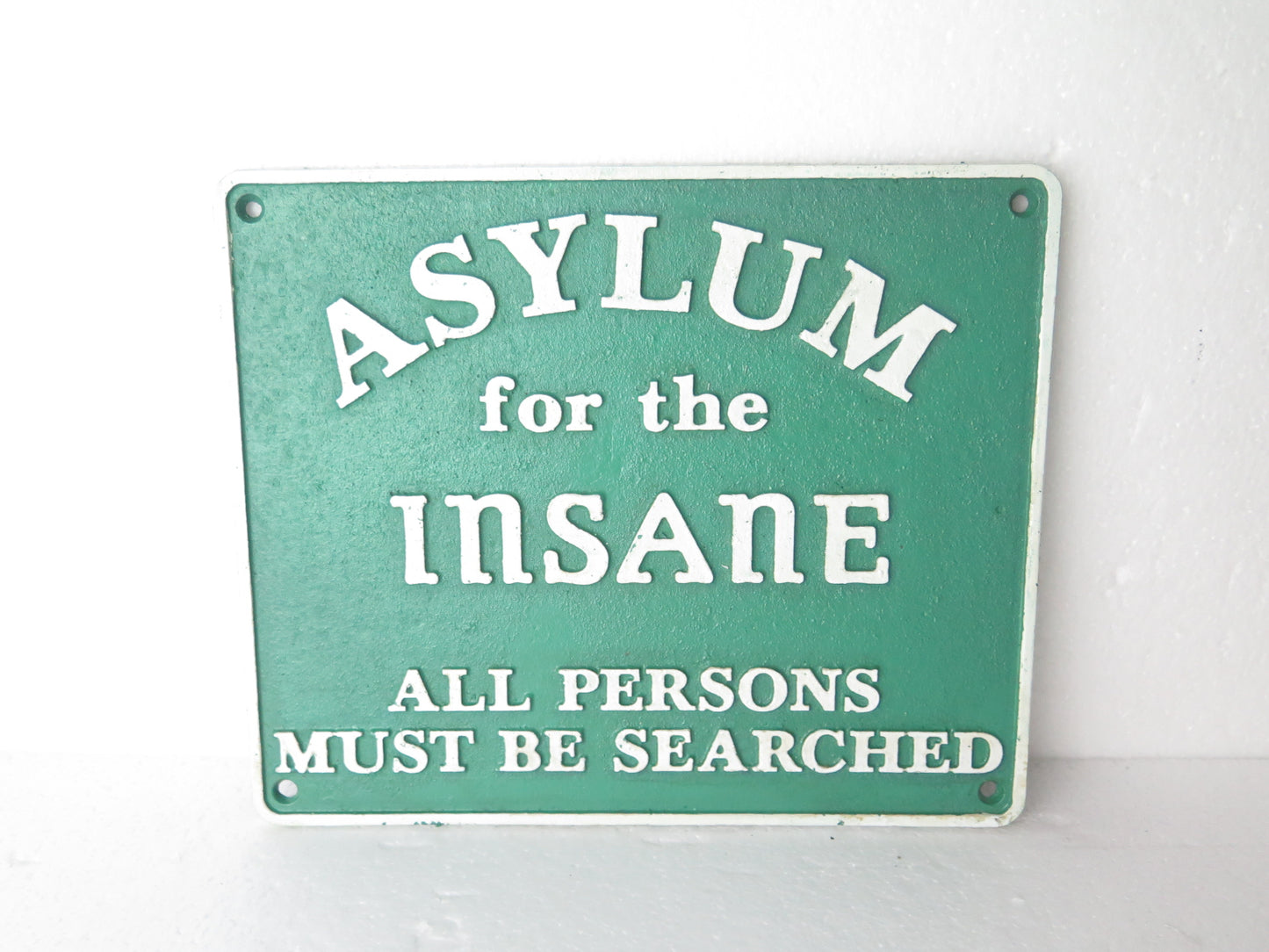 Asylum for the insane sign