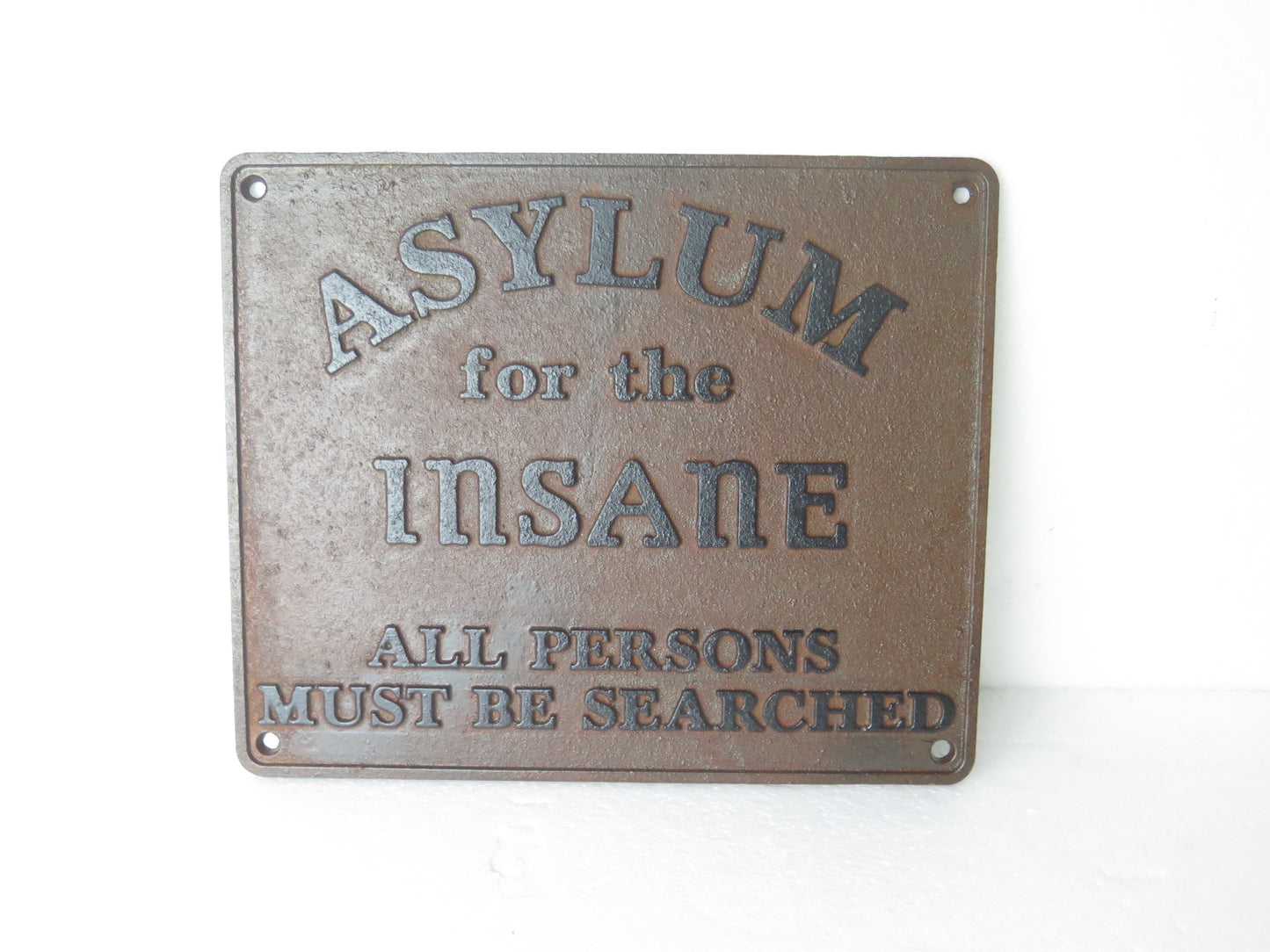 Asylum for the insane sign