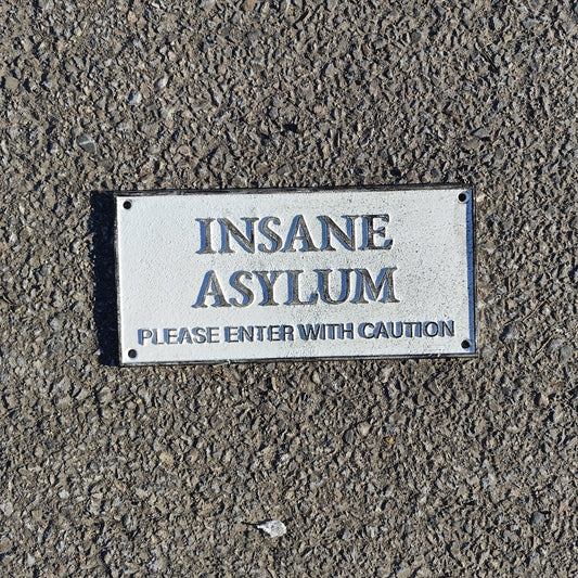 Insane Asylum Sign